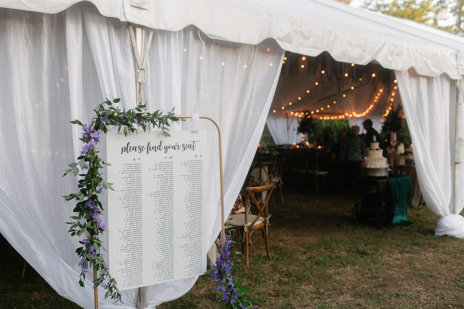 Wedding Reception Tent Entrance with Seating Sign
