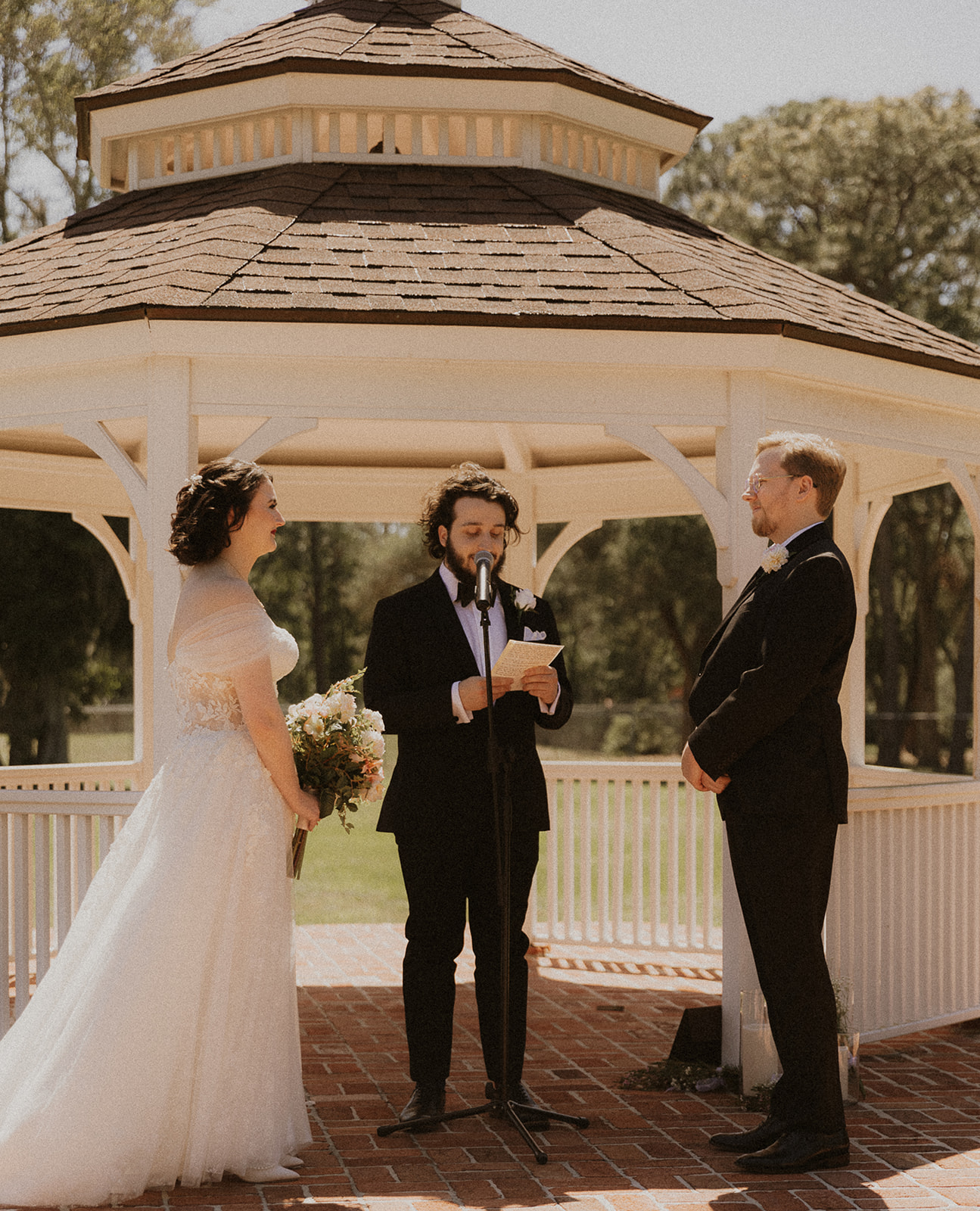 Bride and Groom Saying I Do Before a Gazebo