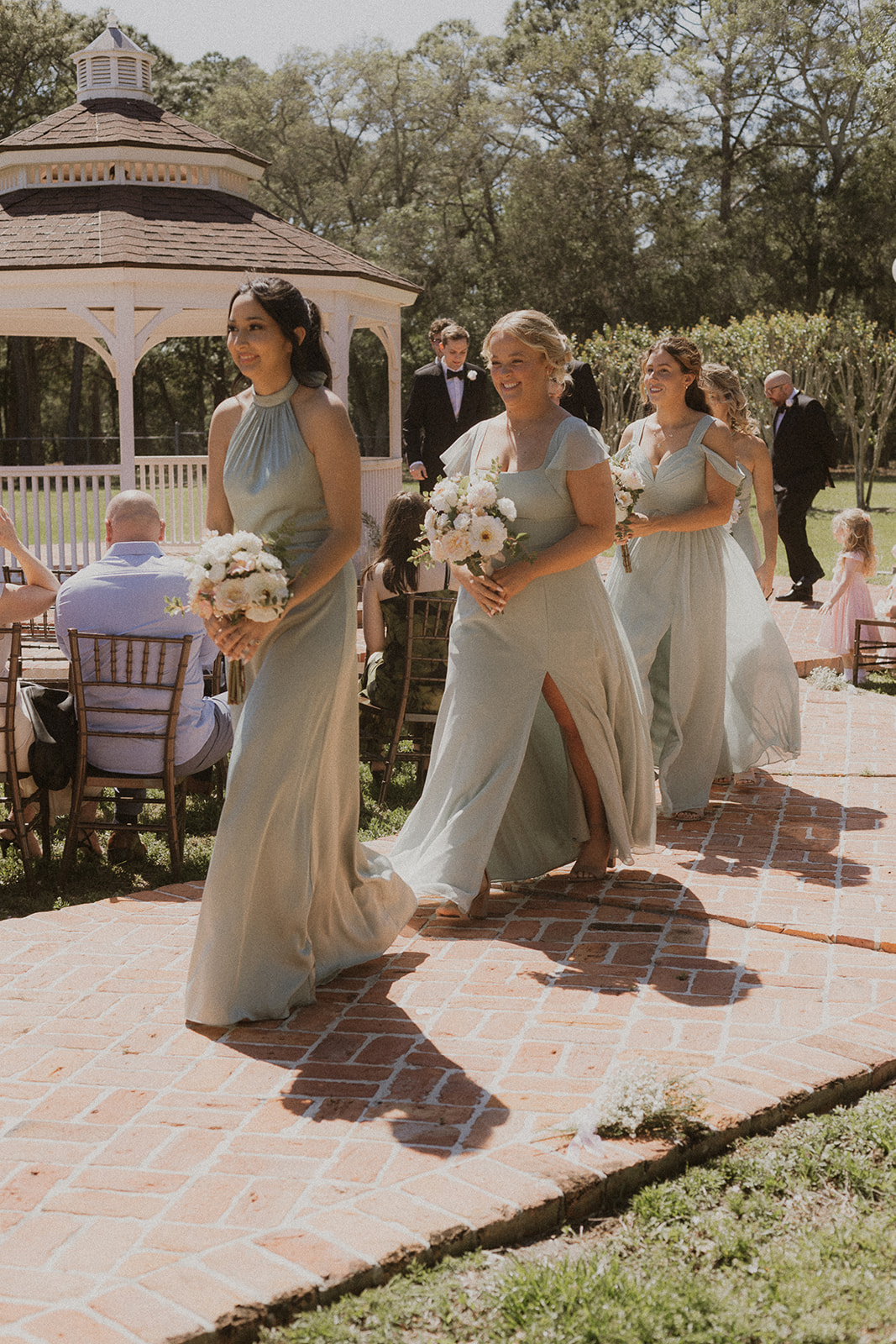 Bridesmaids Walking Down The Aisle