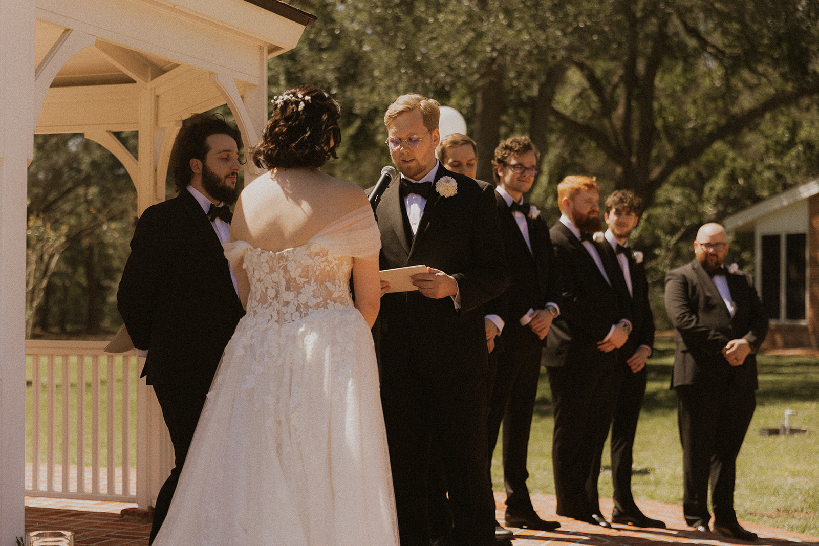 Groom Saying Vows in Outdoor Wedding Ceremony