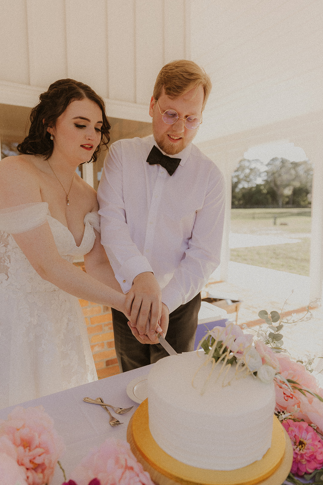 Bride & Groom Cutting the Cake